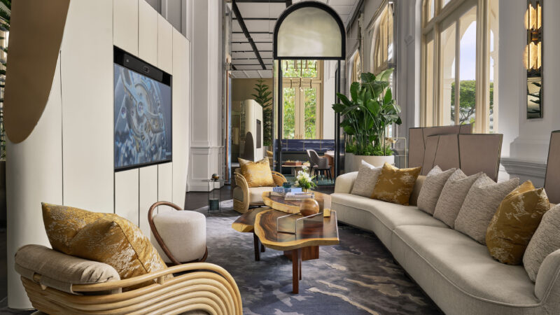 Lounge with sofas and arched windows in official AP House Singapore photography