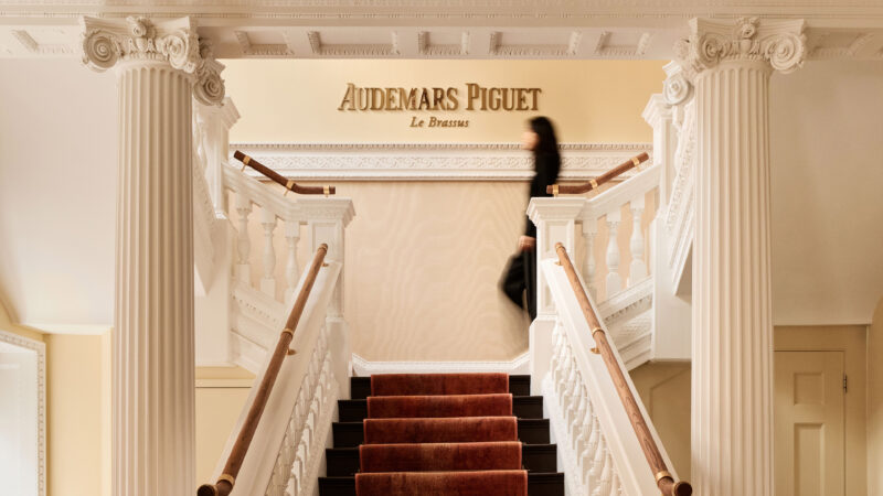 Staircase and visitor in official AP House London photography