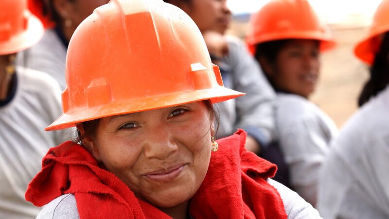 People wearing orange protective helmets in official Chopard sourcing photography