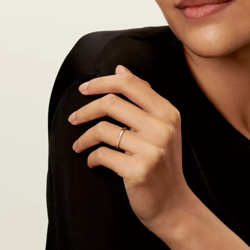 Tiffany Forever rose-gold wedding band worn on the hand