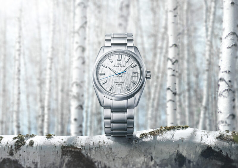 Grand Seiko SLGH005 White Birch watch photographed in a forest-inspired setting