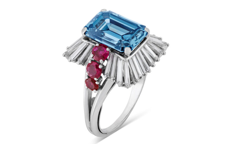 Blue rectangular gemstone ring with surrounding white and pink stones in Christie’s imagery