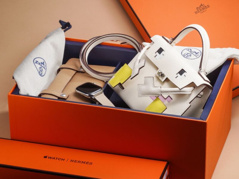 Watch straps and accessories arranged in an orange box in Phillips photography