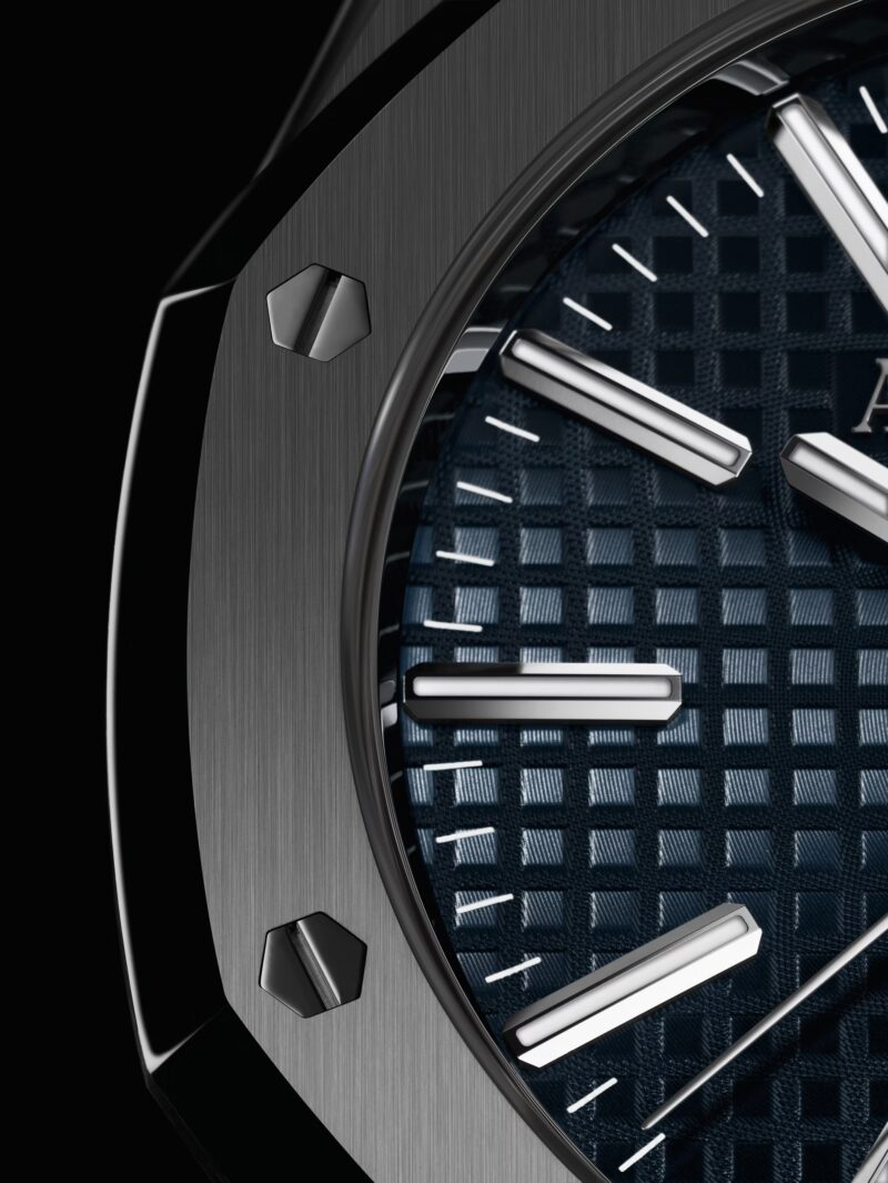 Macro detail of an Audemars Piguet Royal Oak blue dial and applied hour marker