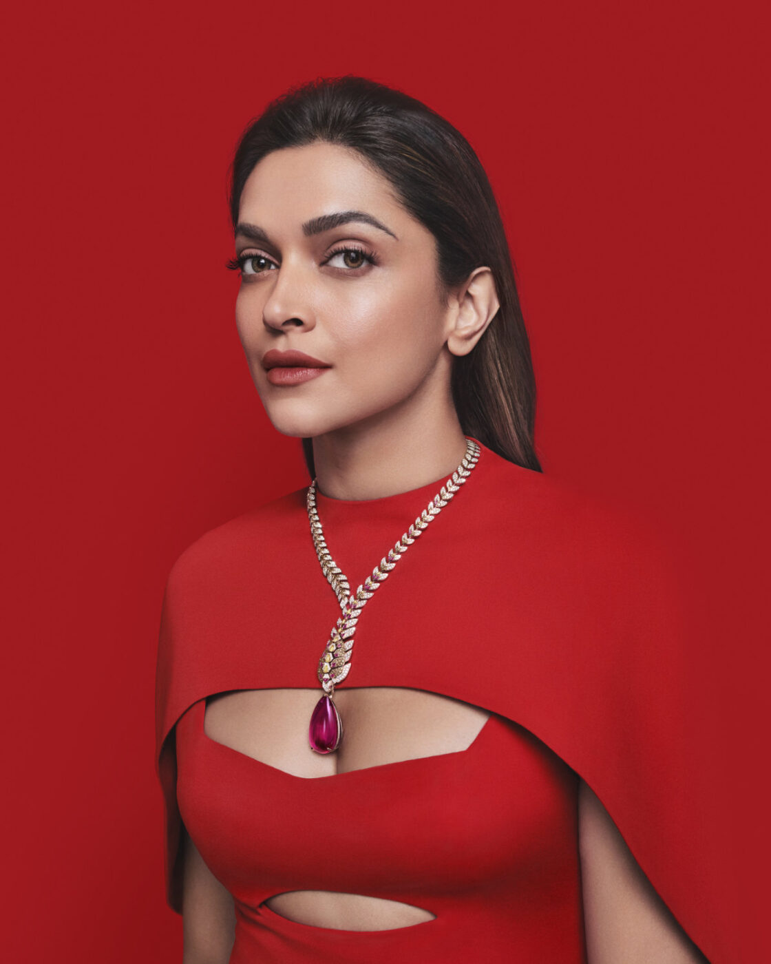 Cartier Nature Sauvage Mochelys necklace worn with red couture styling
