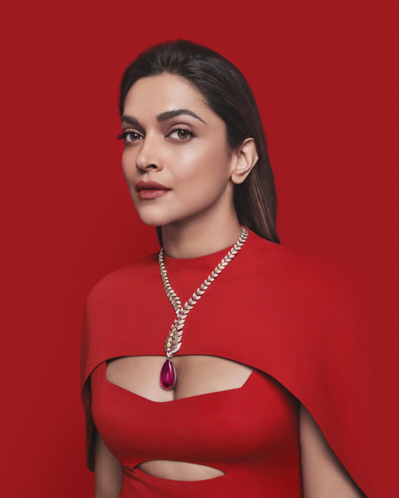 Cartier Nature Sauvage Mochelys necklace worn with red couture styling
