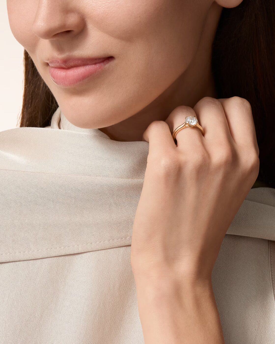 Studio shot of the Cartier Solitaire 1895 solitaire ring from a 3/4 angled view showcasing the brilliant cut diamond
