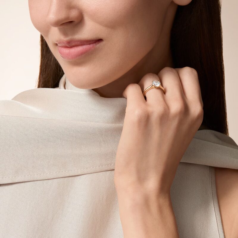 Studio shot of the Cartier Solitaire 1895 solitaire ring from a 3/4 angled view showcasing the brilliant cut diamond