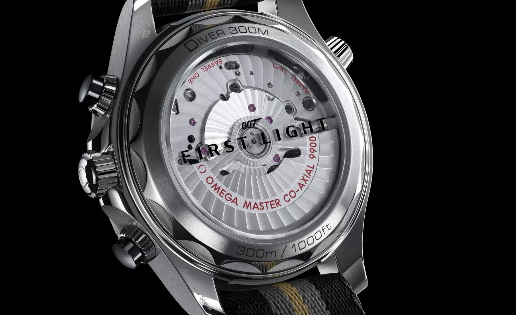 Landscape close-up view of the Omega Seamaster Diver 300M Chronograph 007 First Light sapphire caseback and NATO strap