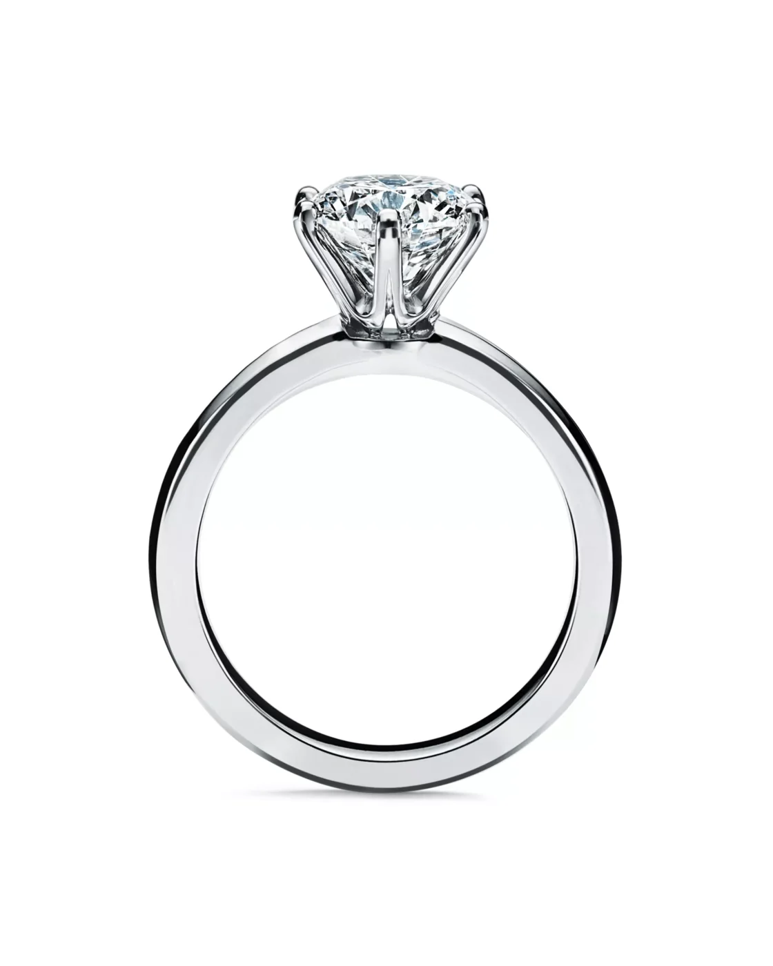 Angled view of the rose gold Tiffany Setting round brilliant solitaire engagement ring showing the six prongs and band details
