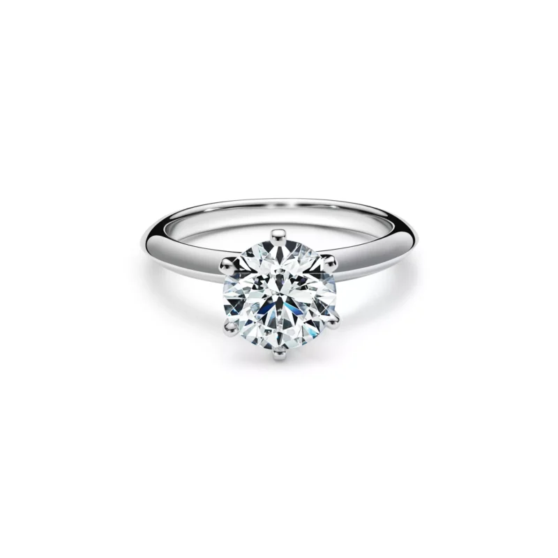 Top-down view of the rose gold Tiffany Setting solitaire engagement ring emphasizing the circular brilliance and six-prong grip