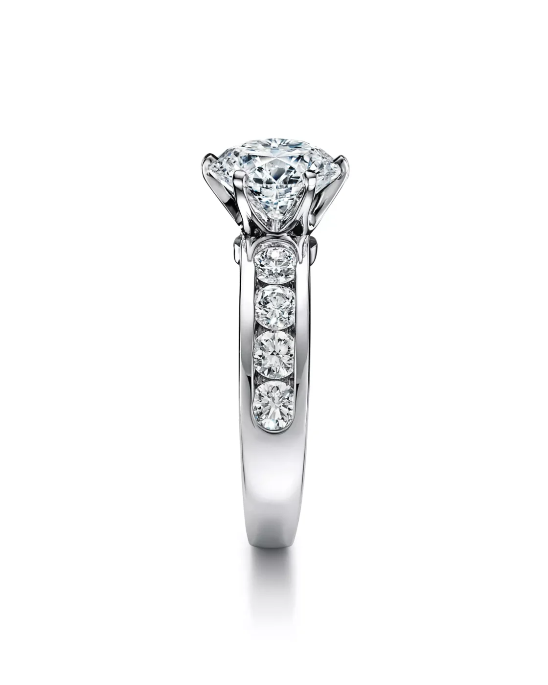 Angled view of the rose gold Tiffany Soleste ring featuring a round center diamond bordered by a double halo of pave diamonds