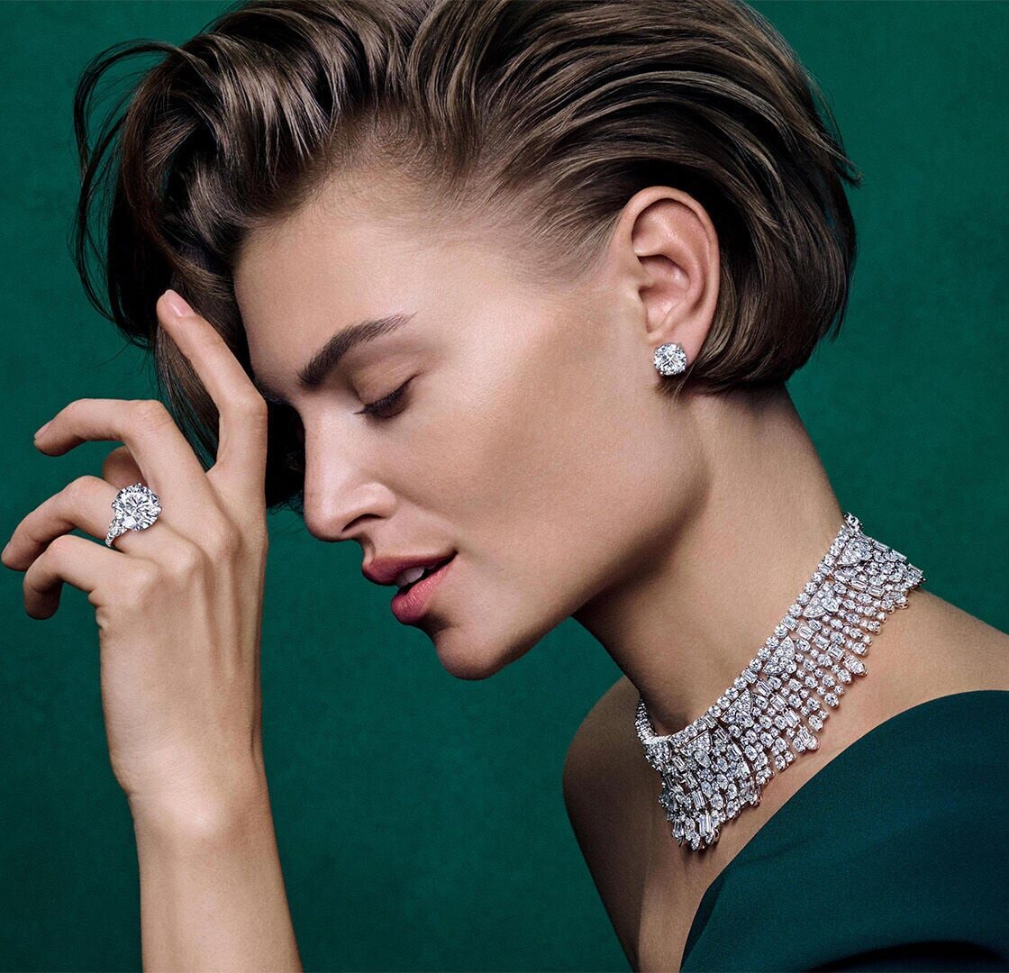 Graff white diamond high jewellery necklace earrings and ring worn