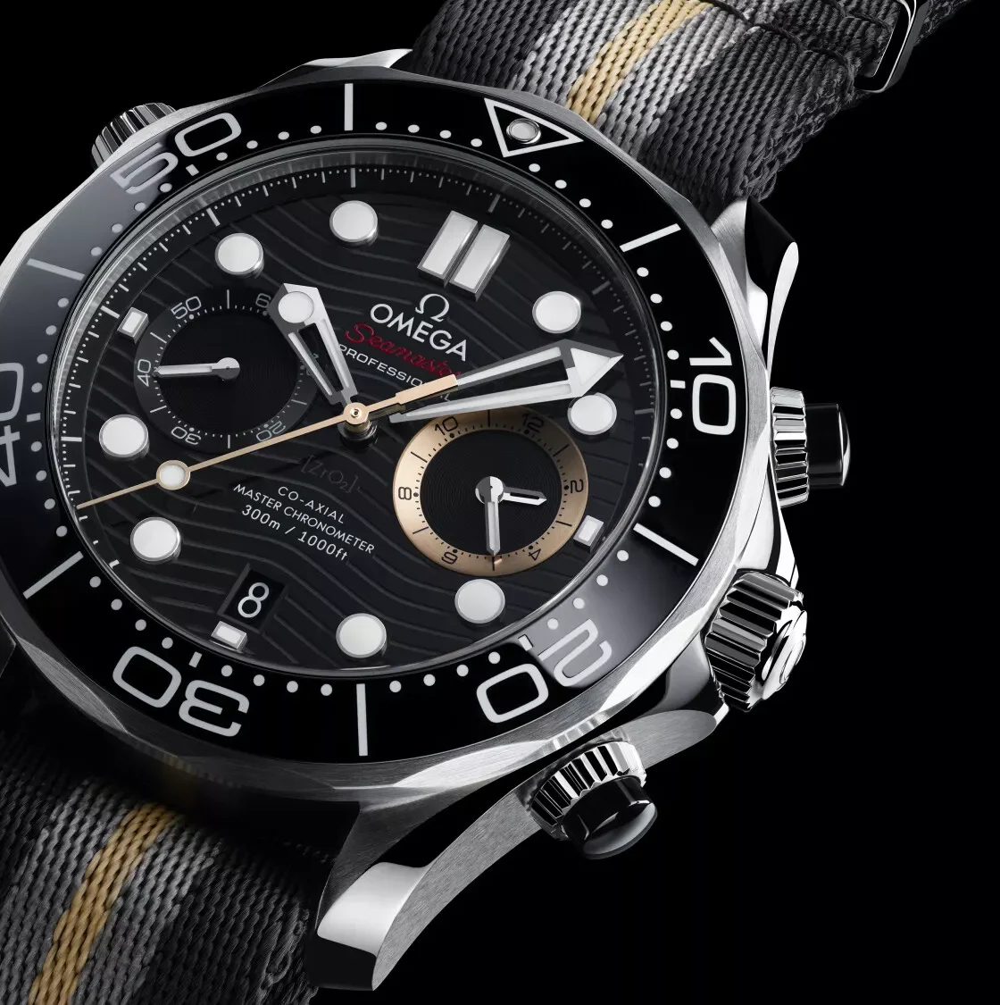 Angled flat lay view of the Omega Seamaster Diver 300M Chronograph 007 First Light on NATO strap