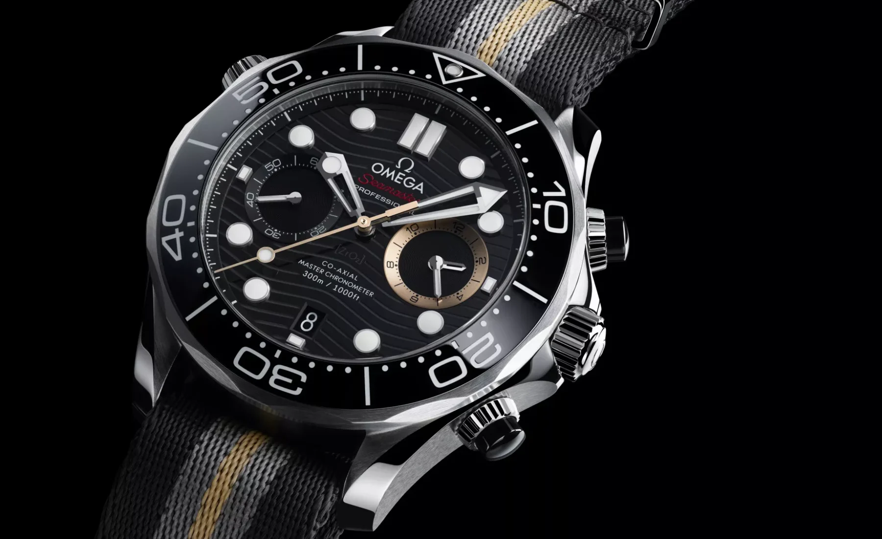 Angled flat lay view of the Omega Seamaster Diver 300M Chronograph 007 First Light on NATO strap