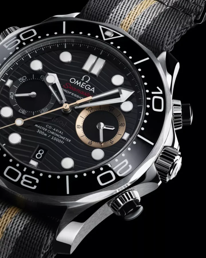 Angled flat lay view of the Omega Seamaster Diver 300M Chronograph 007 First Light on NATO strap
