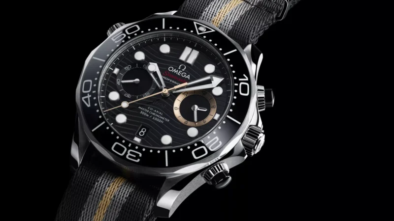 Angled flat lay view of the Omega Seamaster Diver 300M Chronograph 007 First Light on NATO strap