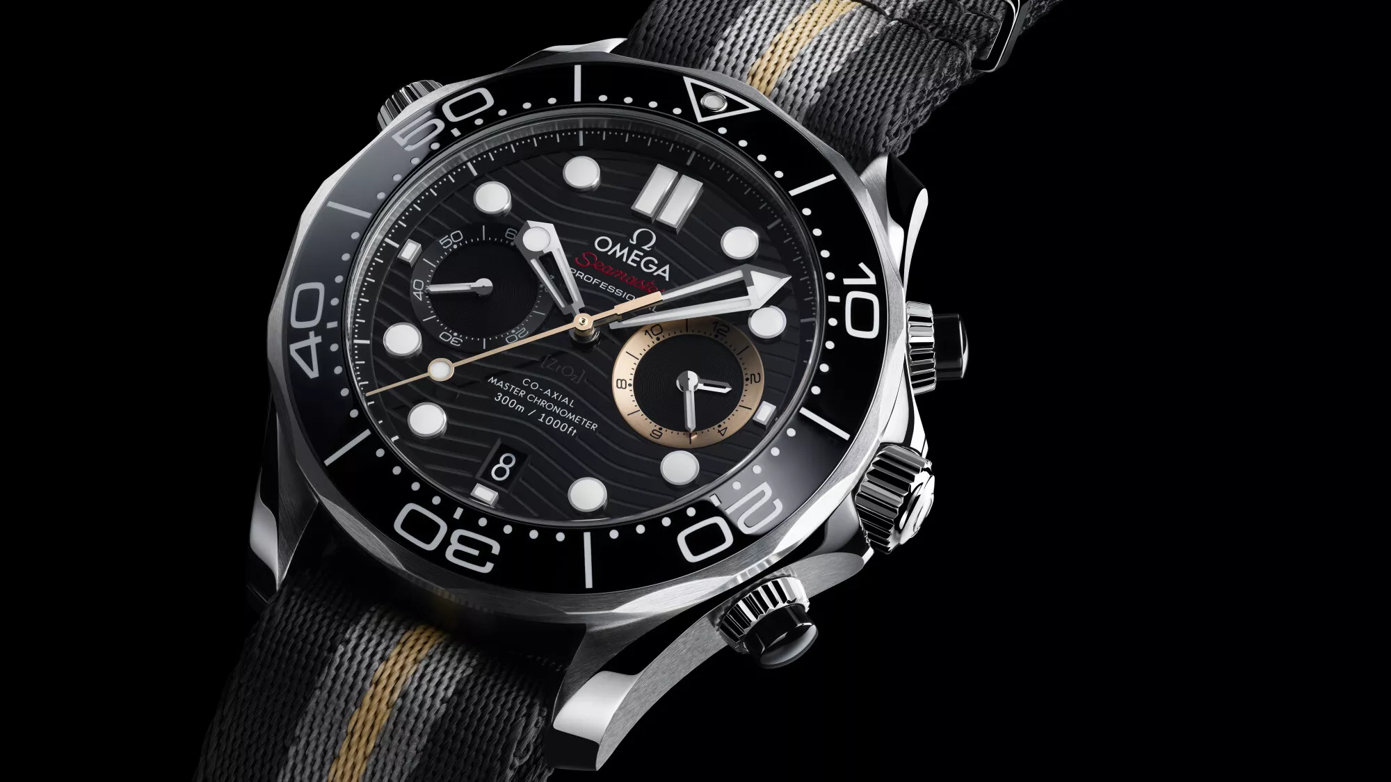 Angled flat lay view of the Omega Seamaster Diver 300M Chronograph 007 First Light on NATO strap