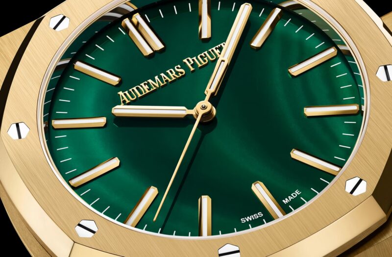 Audemars Piguet Royal Oak Malachite dial macro with yellow gold bezel