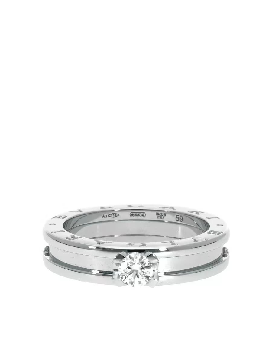 Studio product photo of a Bulgari B.zero1 solitaire diamond ring in 18K white gold