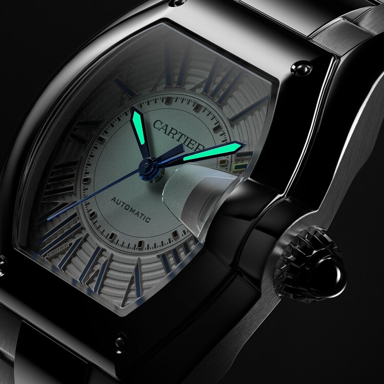 Cartier Roadster 2026 dial in low light showing luminous hands