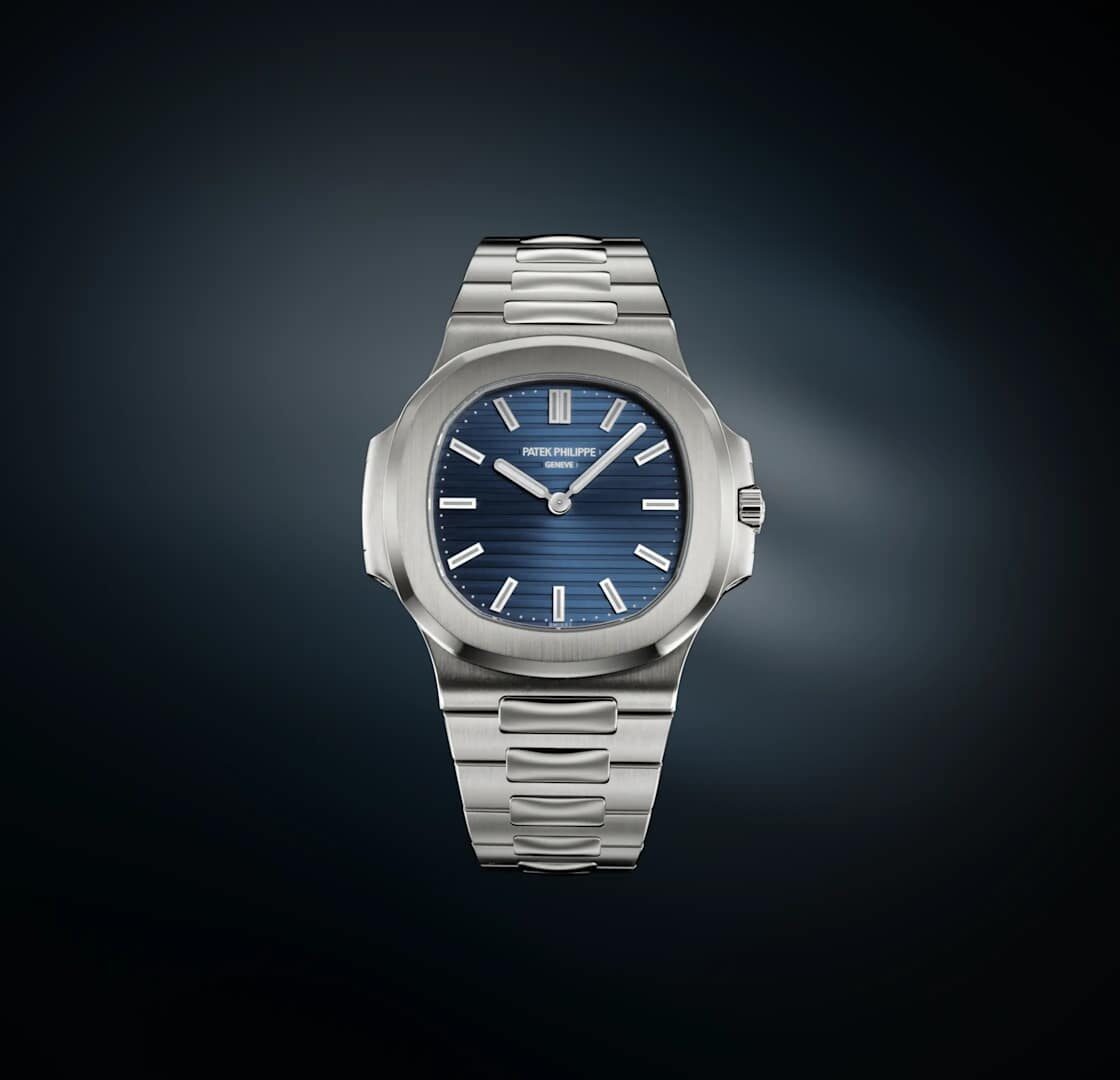 Patek Philippe Nautilus 50th Anniversary front view on blue background