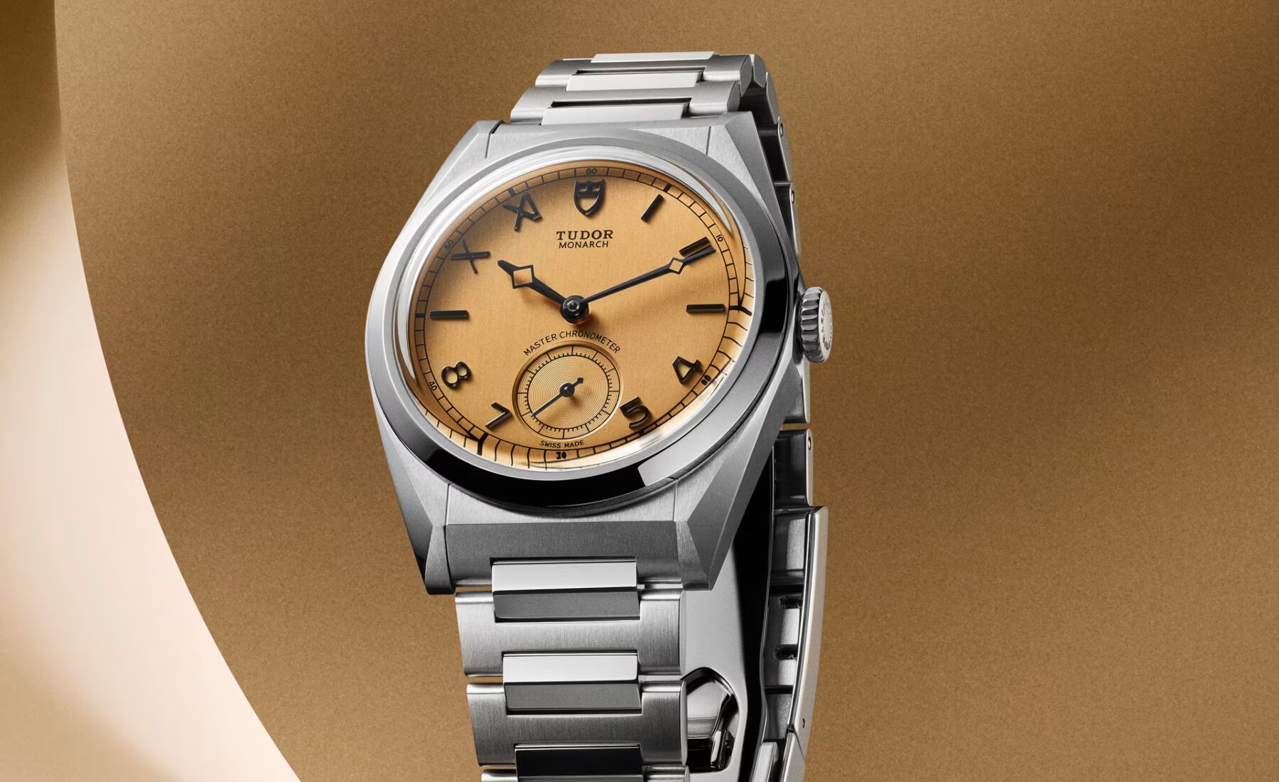 Angled front view of the Tudor Monarch showing the integrated bracelet and faceted case details