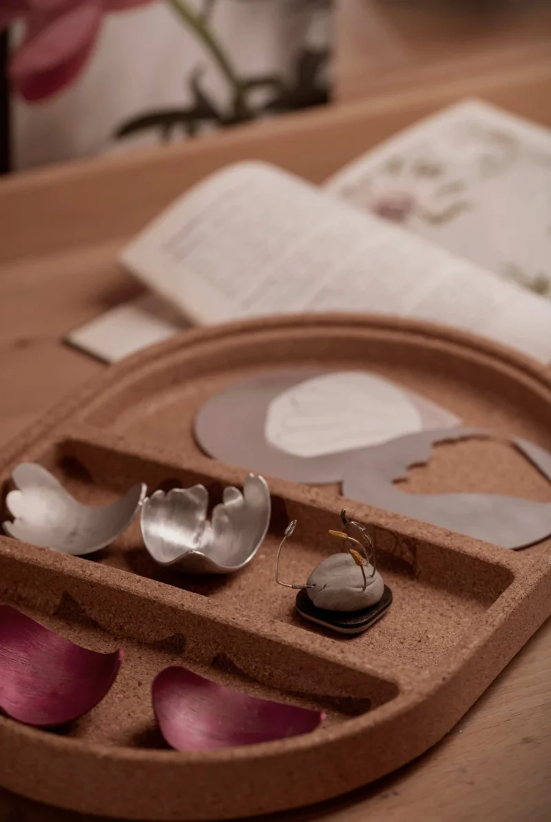 Tools and jewellery models on a Chopard workbench