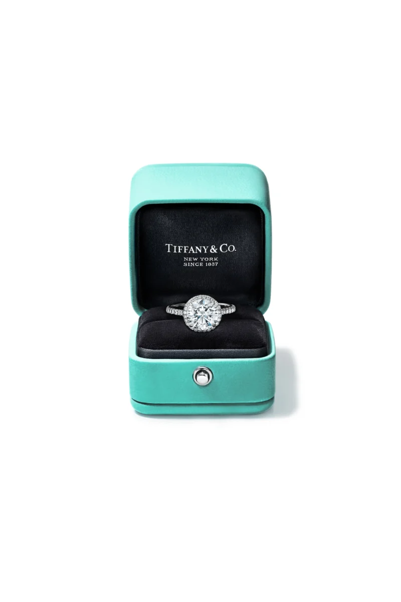 Tiffany Soleste round diamond engagement ring in an open Blue Box