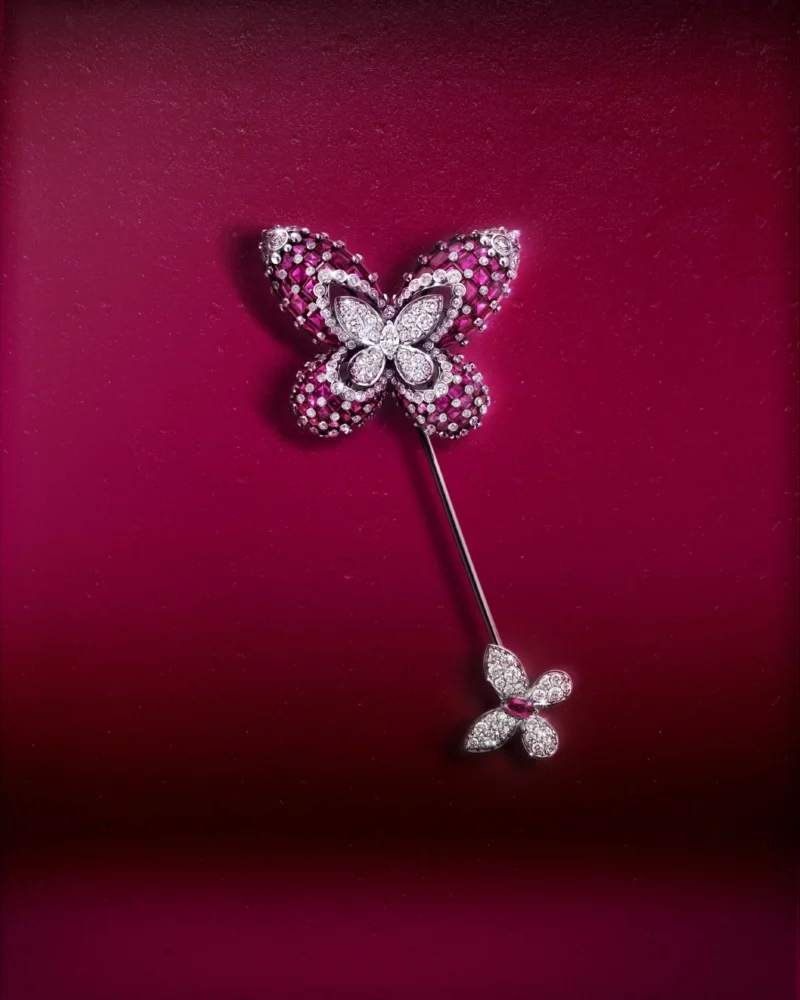 Graff butterfly brooch on a magenta gallery field