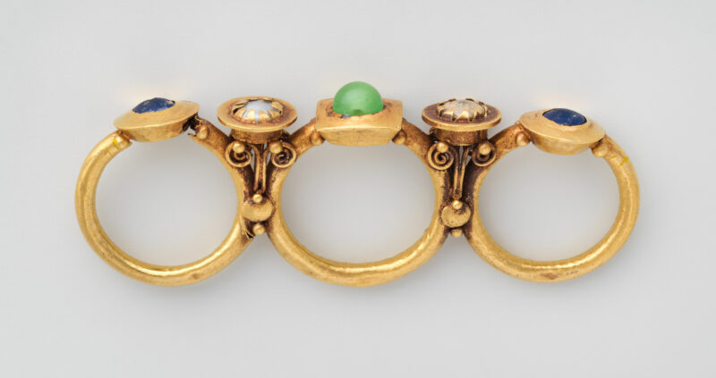 Ancient triple ring showing structure, wear and later condition