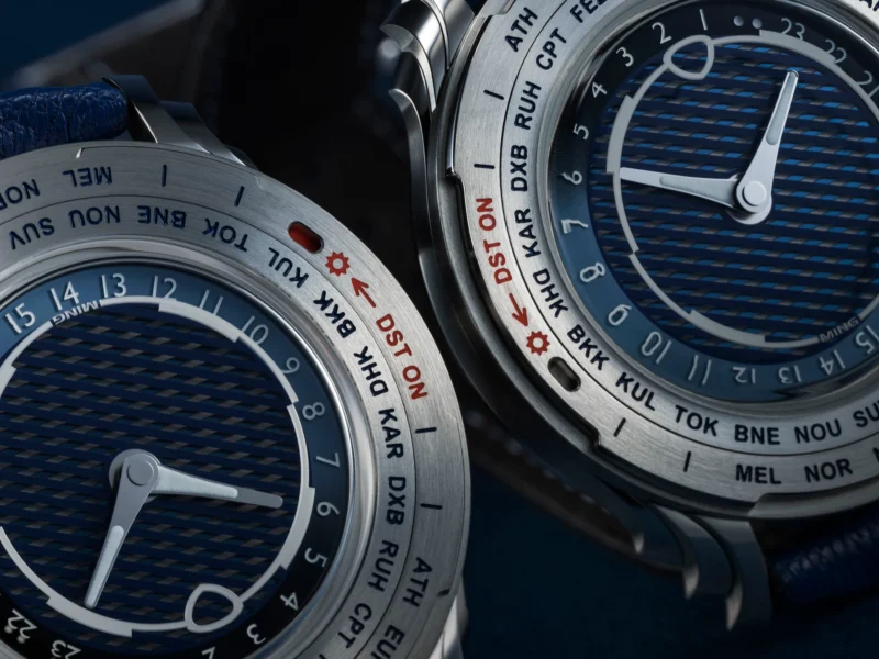 Close view of the MING 57.05 Comet city bezels and blue Comet Tail dial