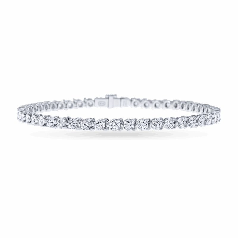Harry Winston round brilliant diamond tennis bracelet in platinum.