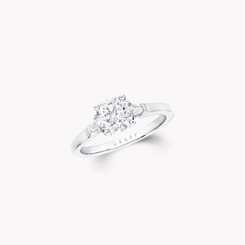 Graff Promise RT01 round diamond ring with tapered baguette side stones.