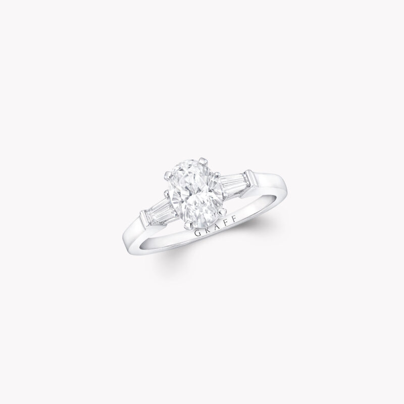 Graff Promise OT01 oval diamond ring with tapered baguette side stones.