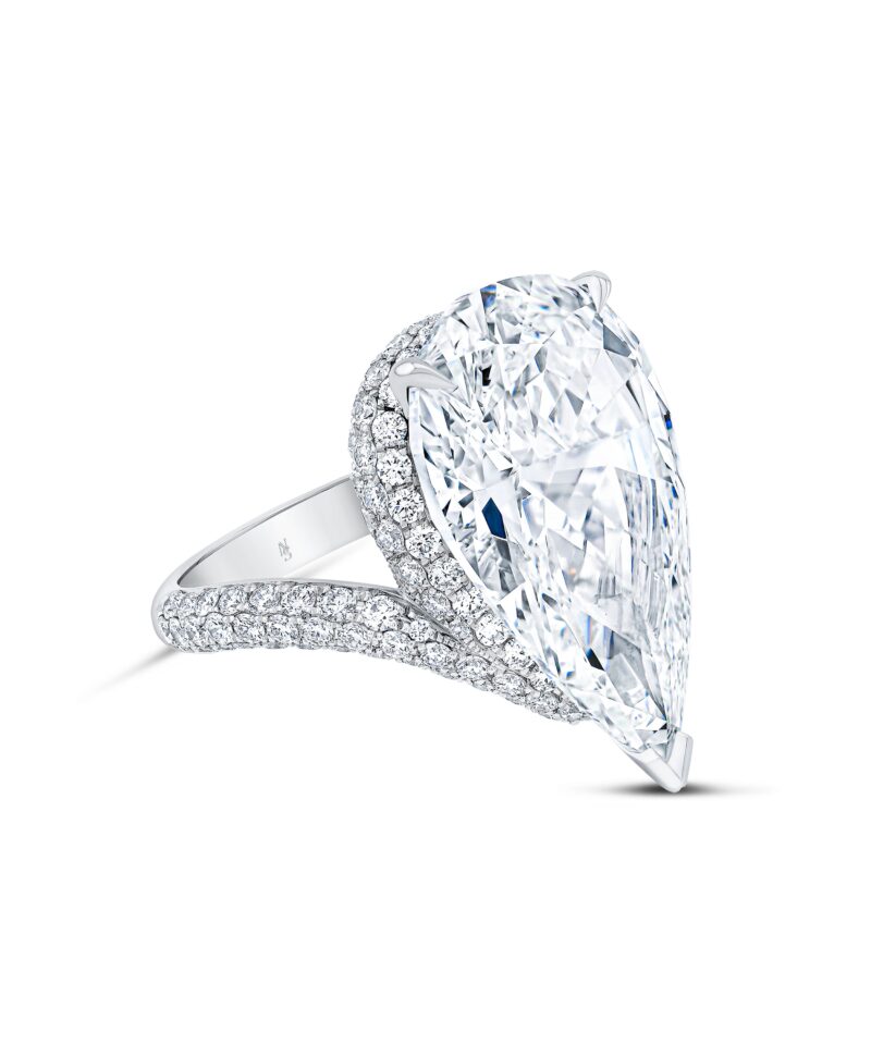 Side view of the Norman Silverman pear diamond solitaire ring.