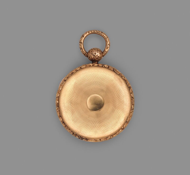 Engine-turned gold back of the Robert Roskell pocket watch.